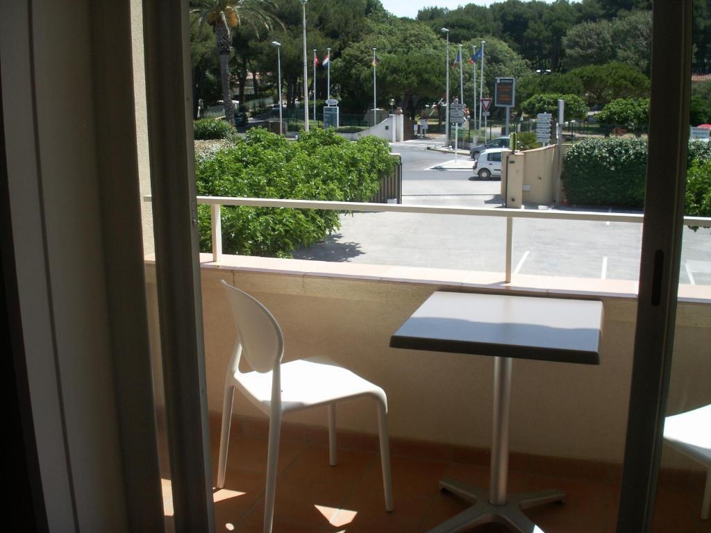 Au Tapis De Sable Hotell Saint-Cyr-sur-Mer Rum bild